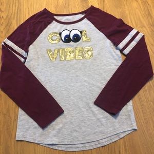 Justice girls long sleeved top EUC